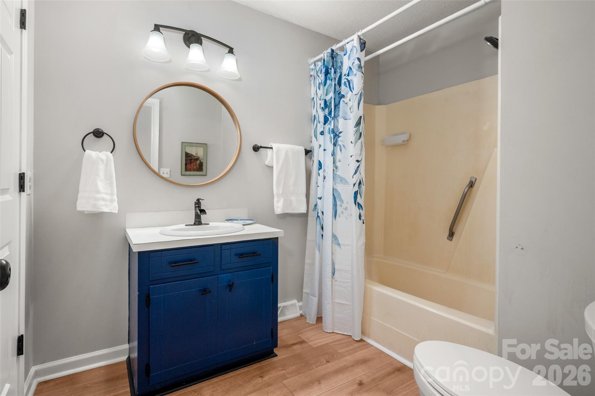 5219 New Town Road Waxhaw, NC 28173 - Photo 25 of 35 a bathroom with a sink toilet and shower