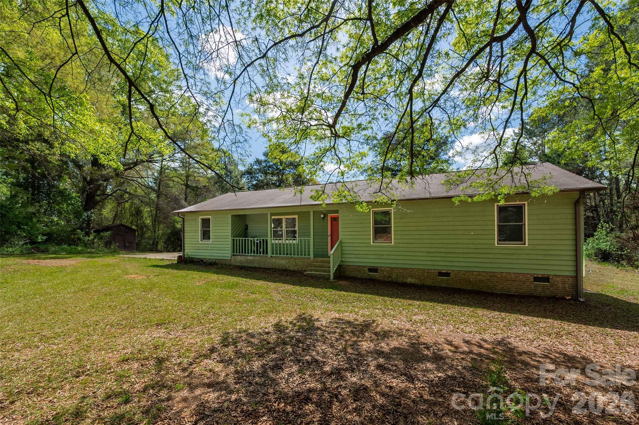 5219 New Town Road Waxhaw, NC 28173 - Photo 28 of 35 a view of a house with a garden
