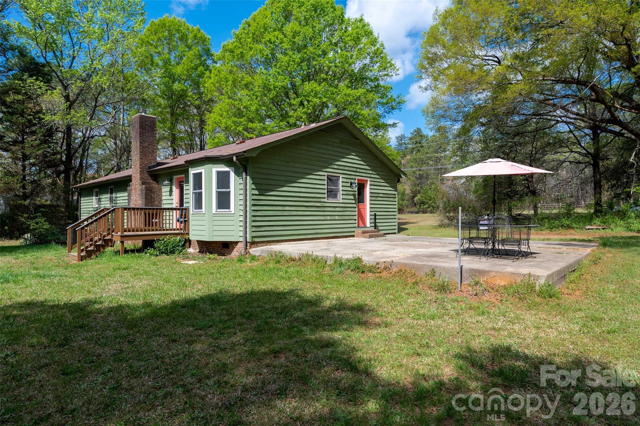 5219 New Town Road Waxhaw, NC 28173 - Photo 29 of 35 a swimming pool with outdoor seating and yard