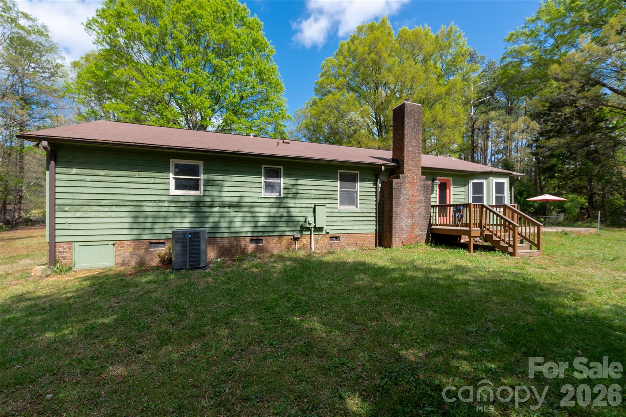 5219 New Town Road Waxhaw, NC 28173 - Photo 30 of 35 a front view of a house with garden