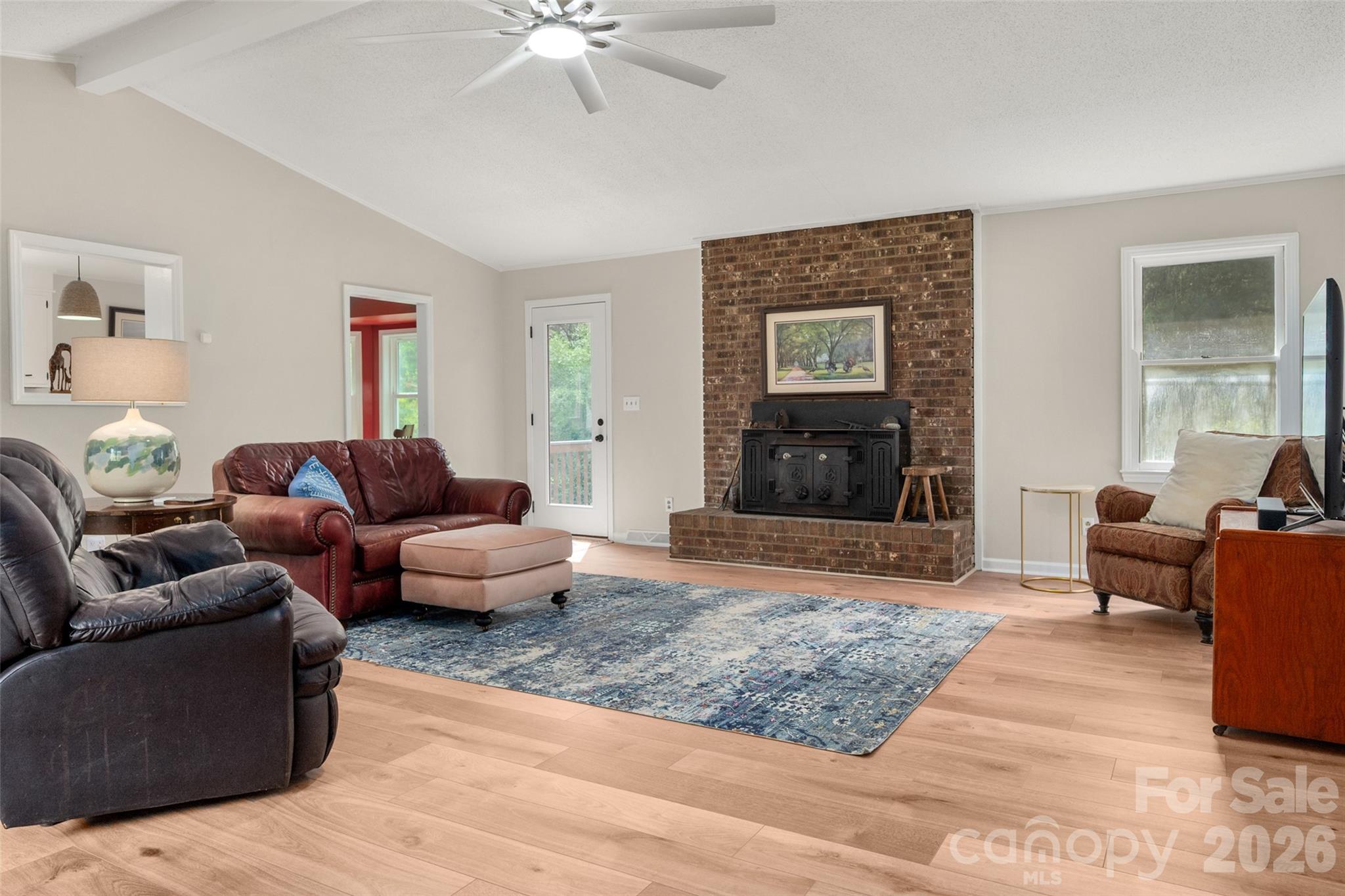 5219 New Town Road Waxhaw, NC 28173 - Photo 7 of 35 a living room with furniture and a fireplace