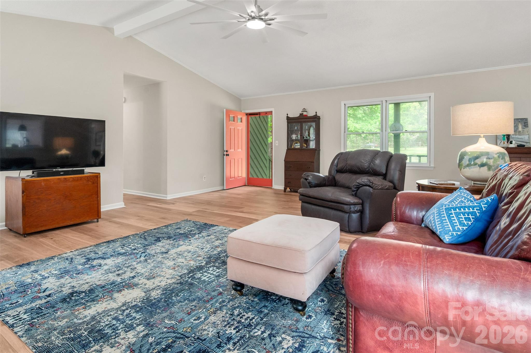 5219 New Town Road Waxhaw, NC 28173 - Photo 10 of 35 a living room with furniture and a flat screen tv