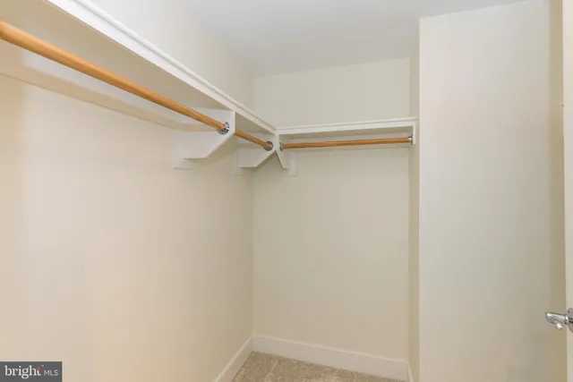 a view of an empty walk in closet