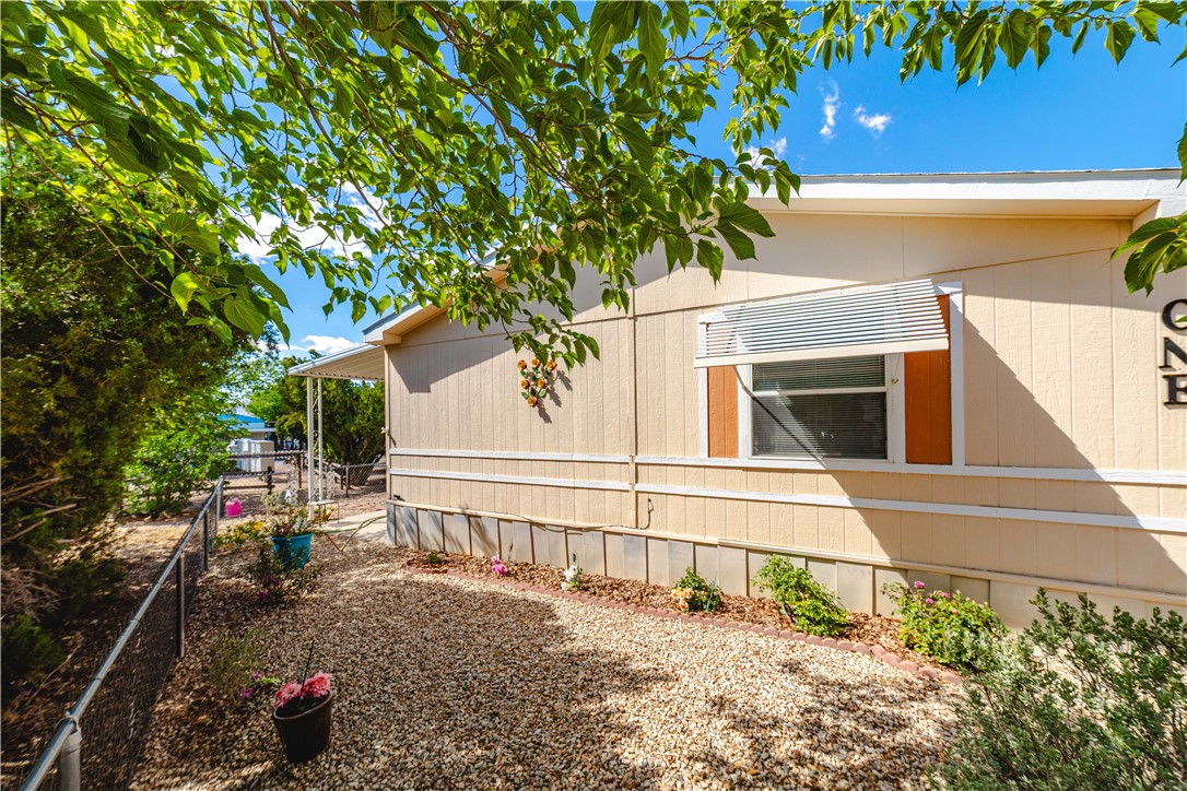 3003 Hualapai Mountain Road Kingman, AZ 86401 - Photo 42 of 49 front view of a house with a yard