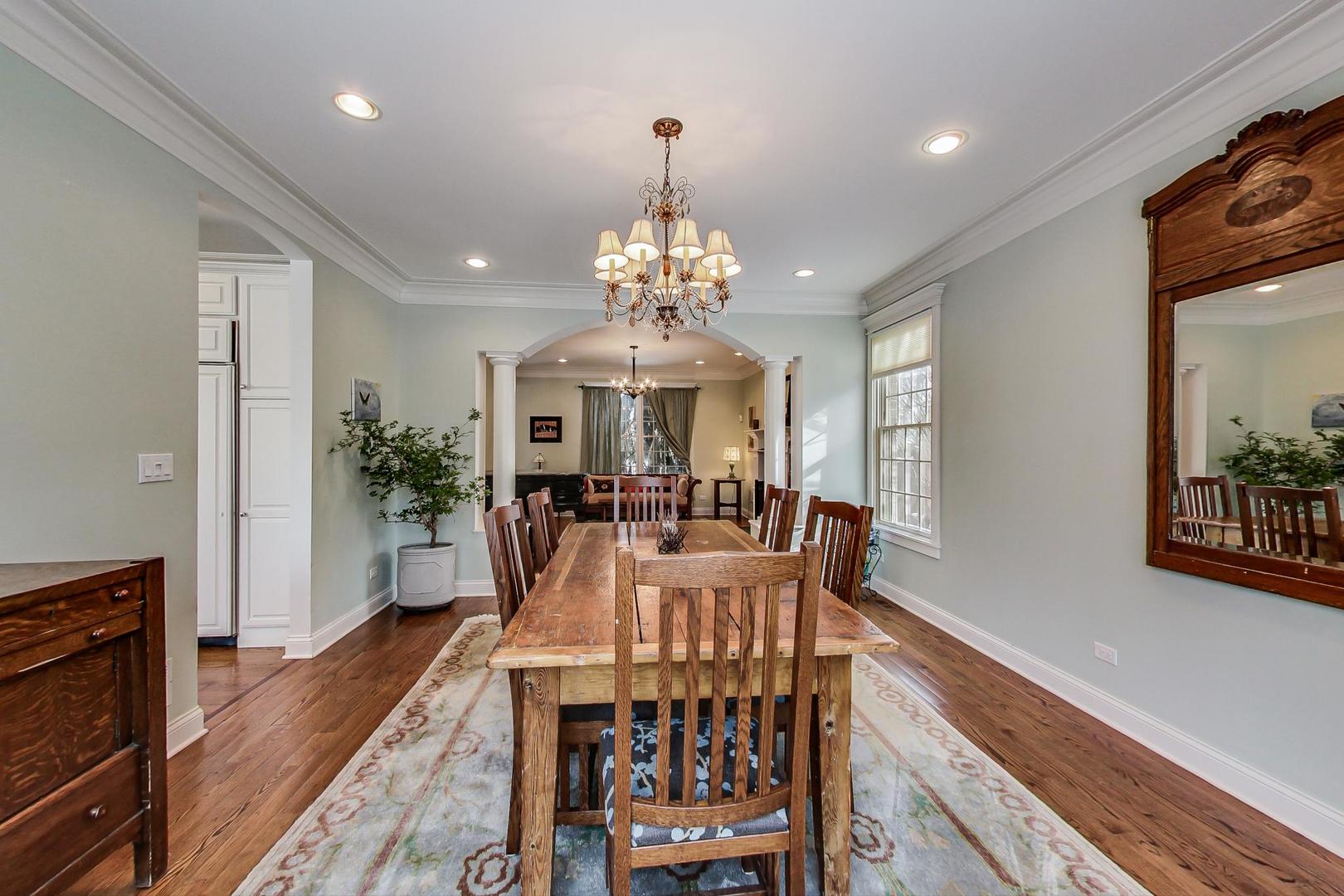 819 Redbud Lane Wilmette, IL 60091 - Photo 12 of 70 a view of a dining room with furniture window and wooden floor