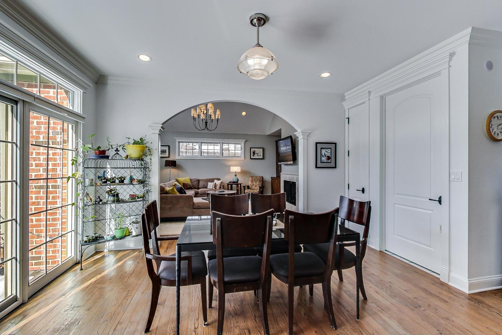 819 Redbud Lane Wilmette, IL 60091 - Photo 16 of 70 a view of a dining room with furniture window and wooden floor
