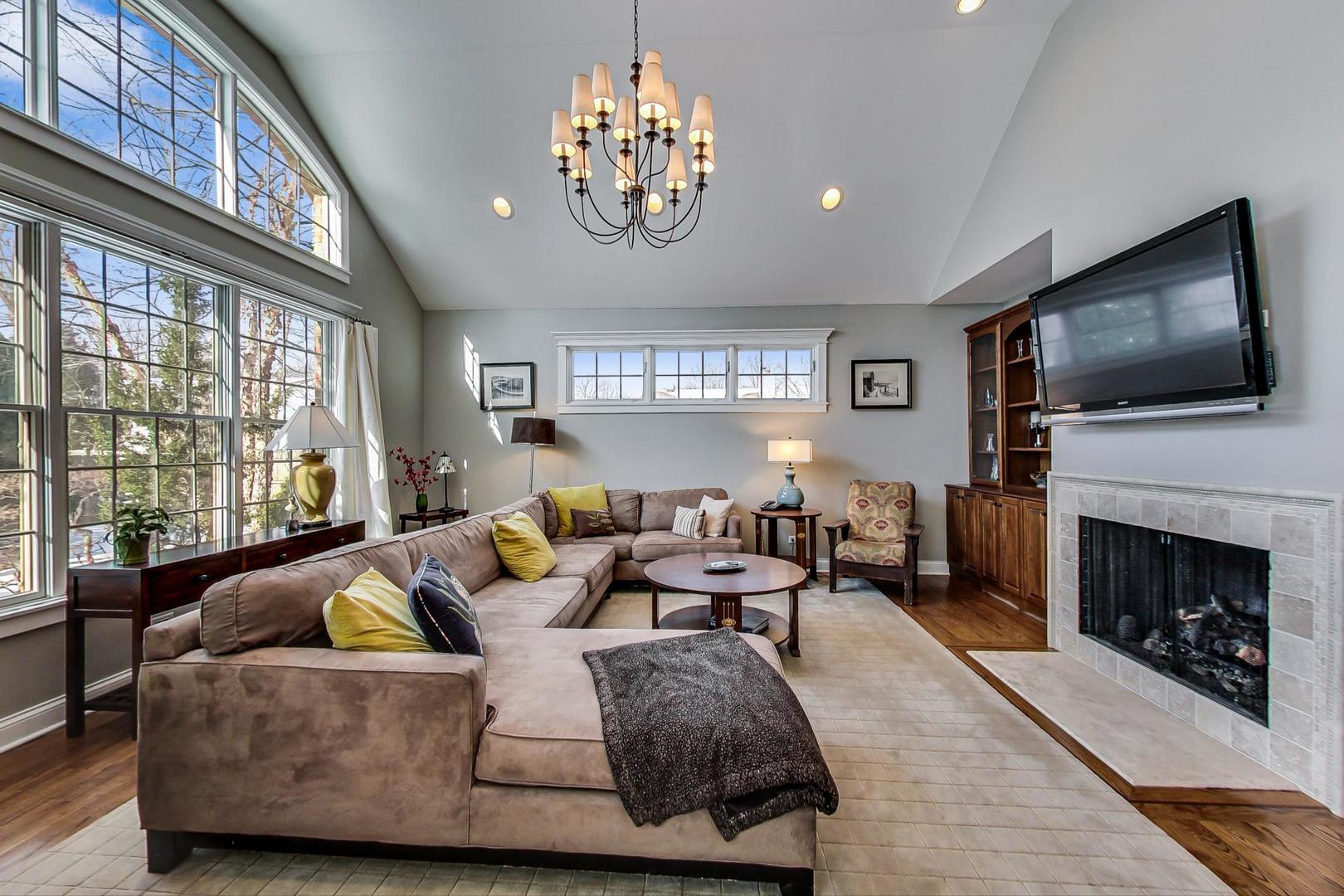 819 Redbud Lane Wilmette, IL 60091 - Photo 19 of 70 a living room with fireplace furniture and a flat screen tv