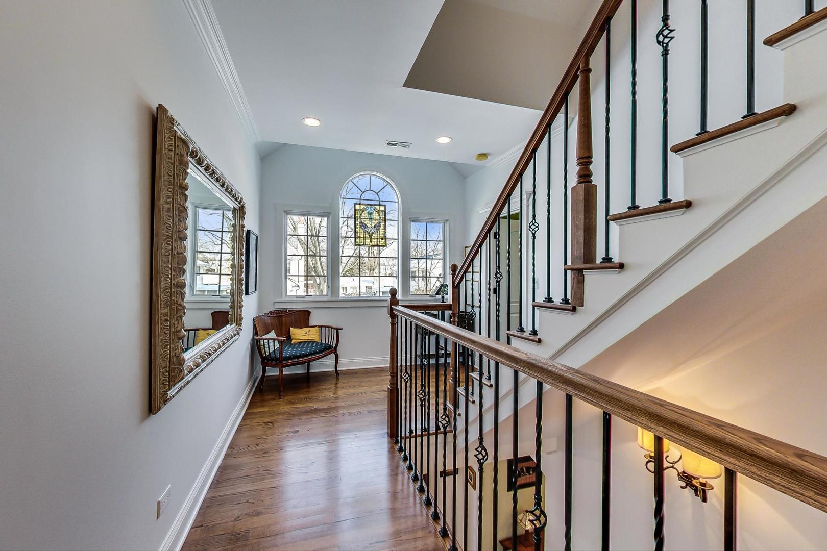 819 Redbud Lane Wilmette, IL 60091 - Photo 27 of 70 a view of an entryway and livingroom with wooden floor