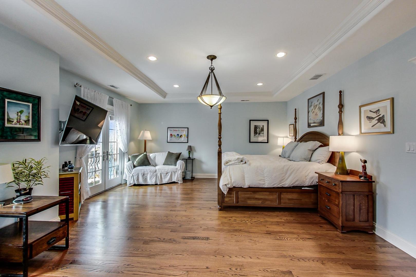 819 Redbud Lane Wilmette, IL 60091 - Photo 30 of 70 a living room with furniture a flat screen tv and a wooden floor