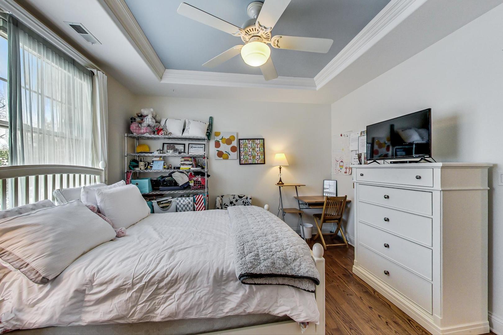 819 Redbud Lane Wilmette, IL 60091 - Photo 43 of 70 a bedroom with a bed and a flat screen tv