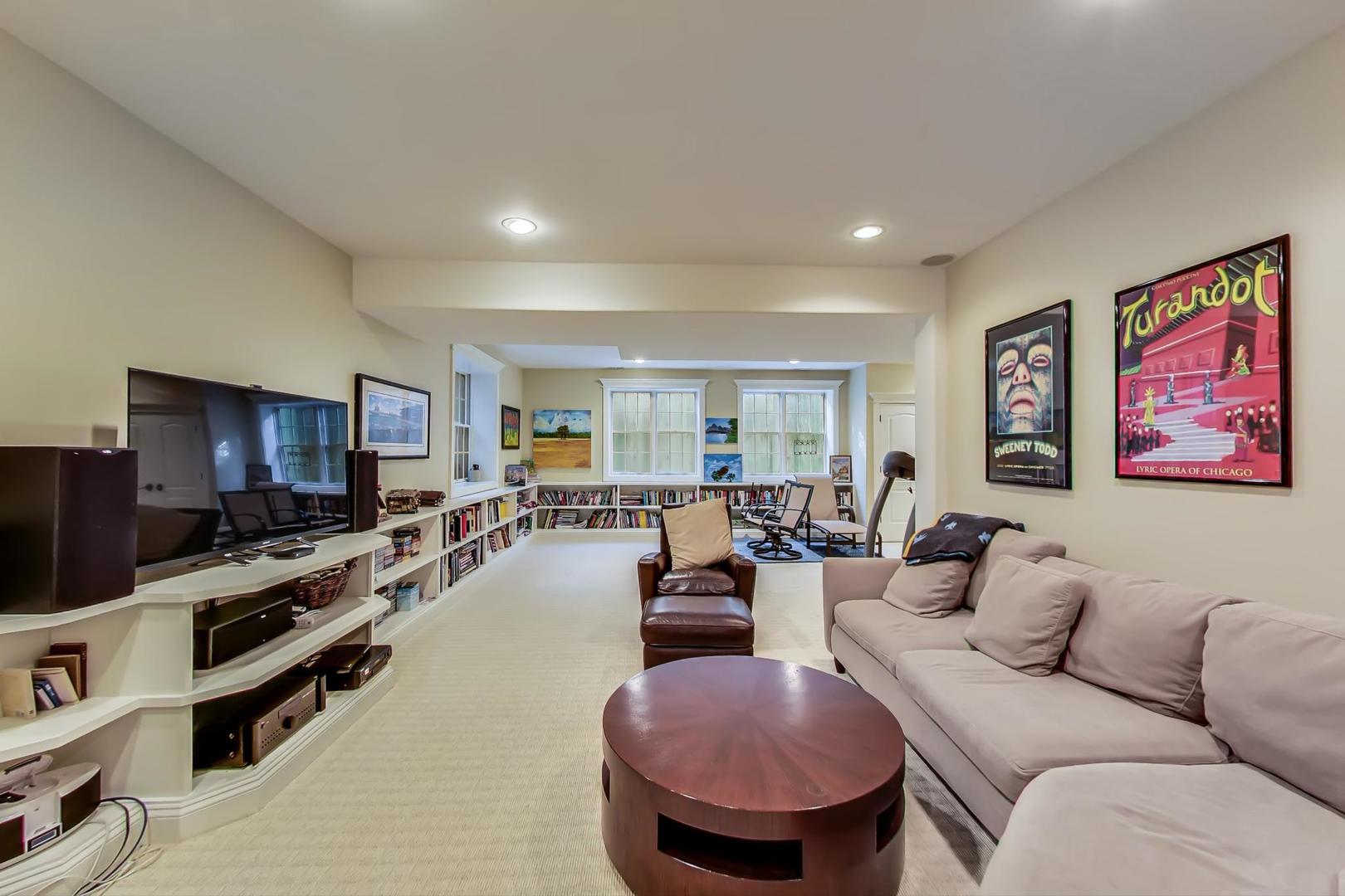 819 Redbud Lane Wilmette, IL 60091 - Photo 57 of 70 a living room with furniture and a flat screen tv