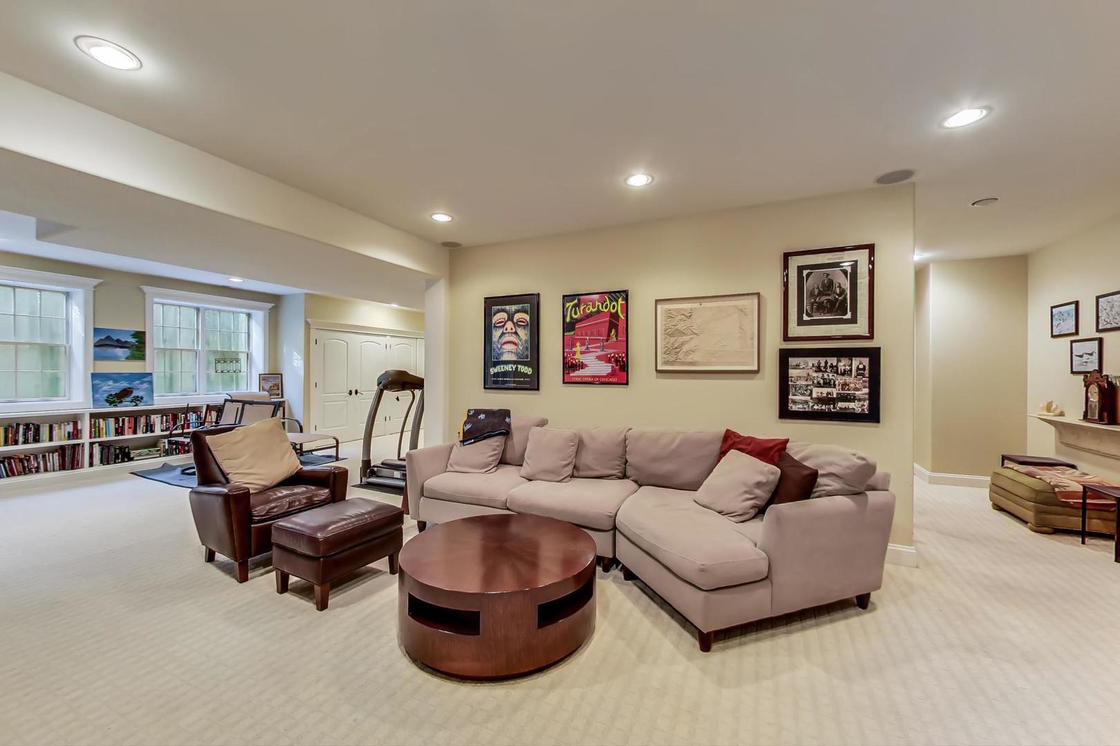 819 Redbud Lane Wilmette, IL 60091 - Photo 58 of 70 a living room with furniture a rug and a window