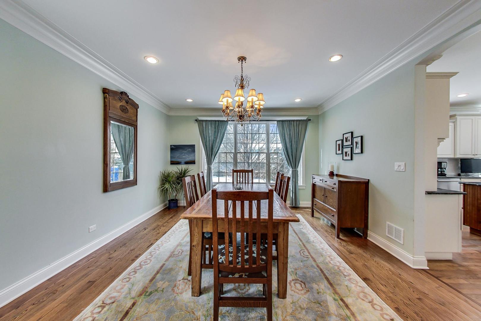 819 Redbud Lane Wilmette, IL 60091 - Photo 10 of 70 a view of a dining room with furniture window and wooden floor