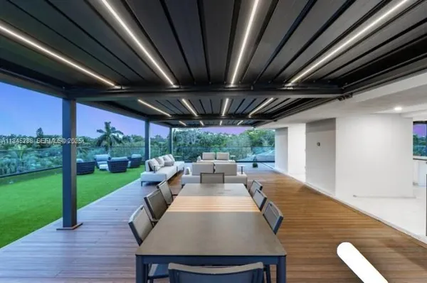 a kitchen with a table and chairs in it