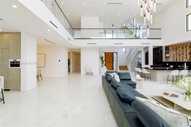 a view of a living room and entryway