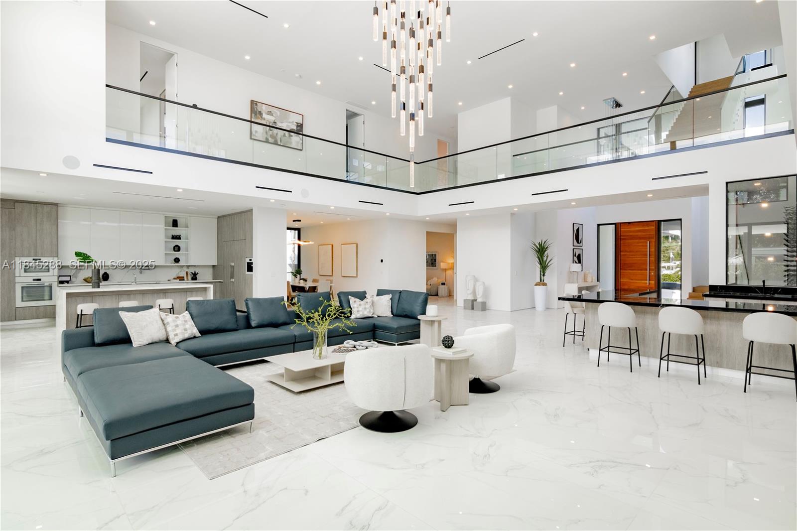 1248 Northeast 89th Street Miami, FL 33138 - Photo 17 of 66 a living room with furniture and a chandelier