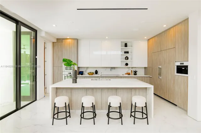 a bathroom with a tub sink shower and mirror