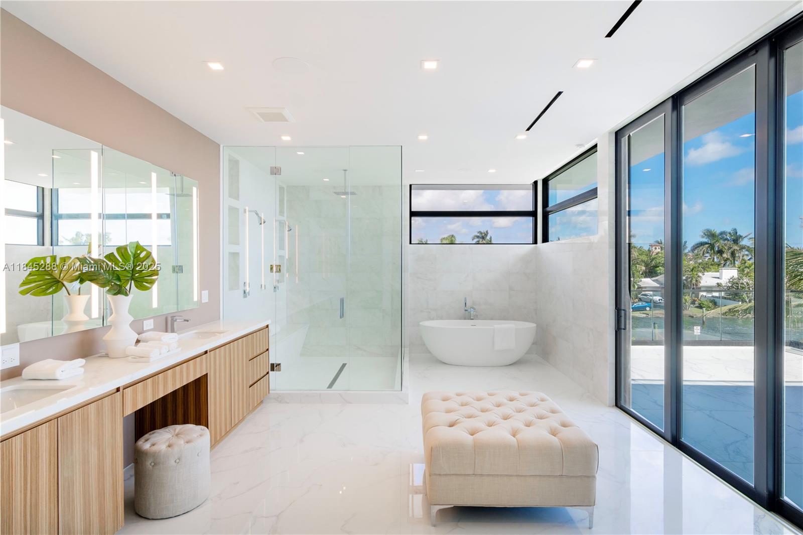 1248 Northeast 89th Street Miami, FL 33138 - Photo 28 of 66 a bathroom with a double vanity sink toilet and shower