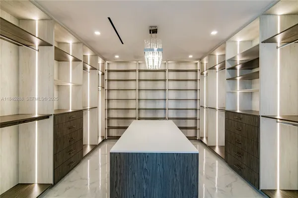 a kitchen with a stove and a cabinets