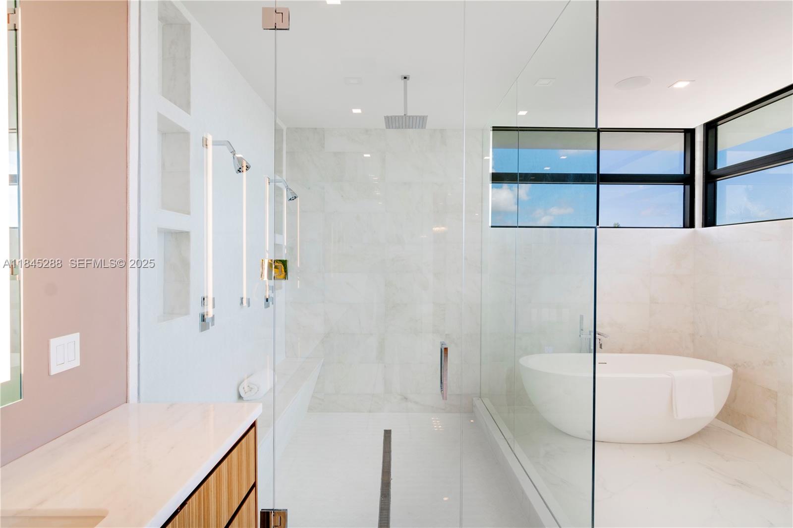 1248 Northeast 89th Street Miami, FL 33138 - Photo 30 of 66 a bathroom with a tub shower and sink