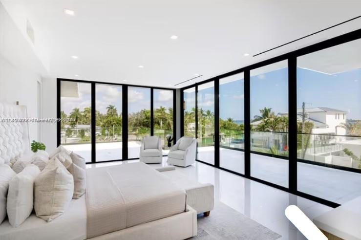 1248 Northeast 89th Street Miami, FL 33138 - Photo 40 of 66 a bedroom with furniture and a large window