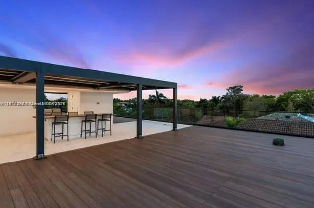 a view of a house with a street