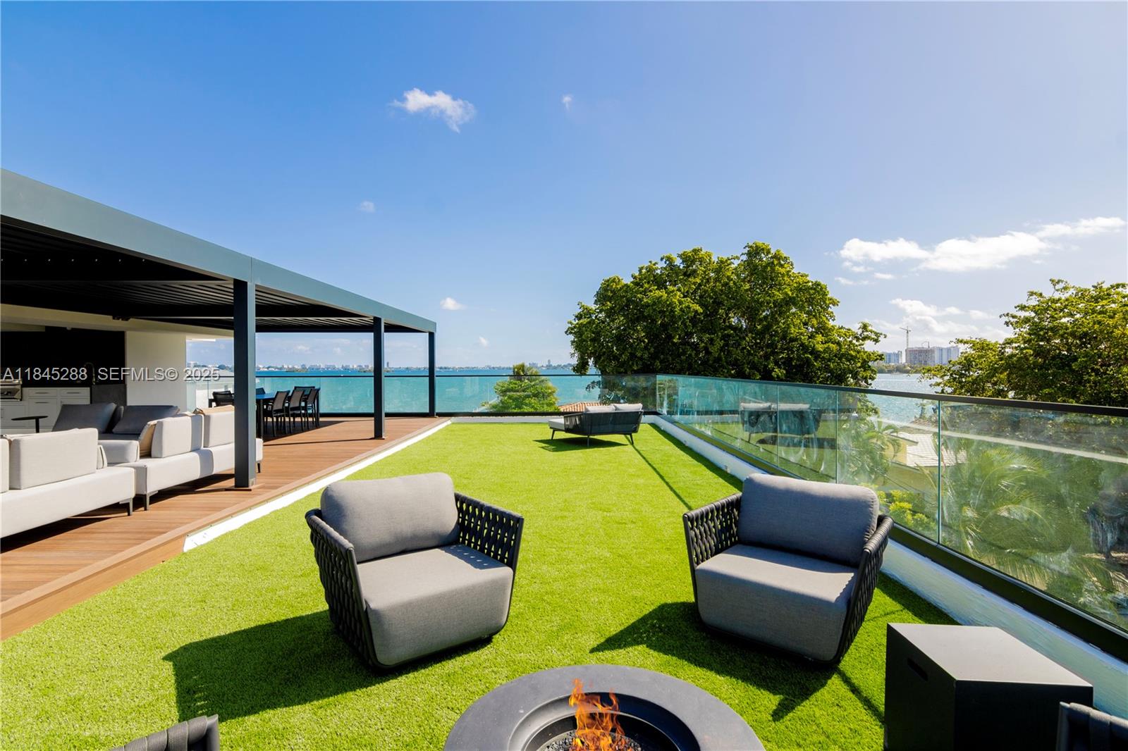 1248 Northeast 89th Street Miami, FL 33138 - Photo 53 of 66 a swimming pool with outdoor seating and yard