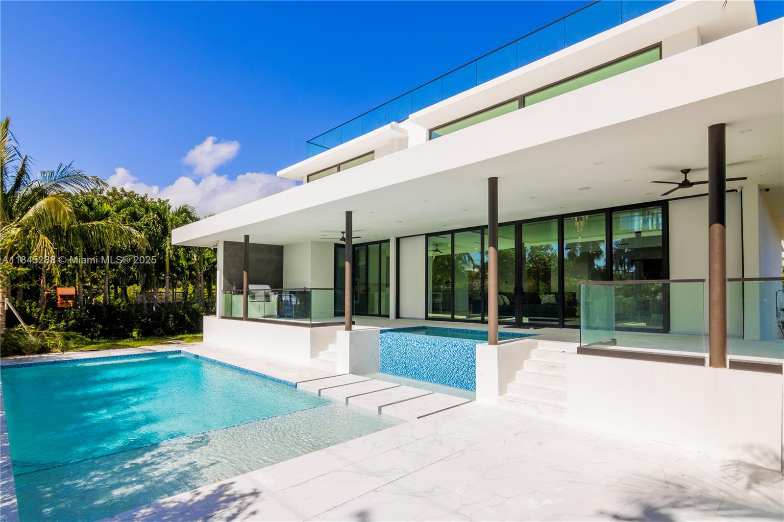 1248 Northeast 89th Street Miami, FL 33138 - Photo 6 of 66 a view of a house with backyard porch and sitting area