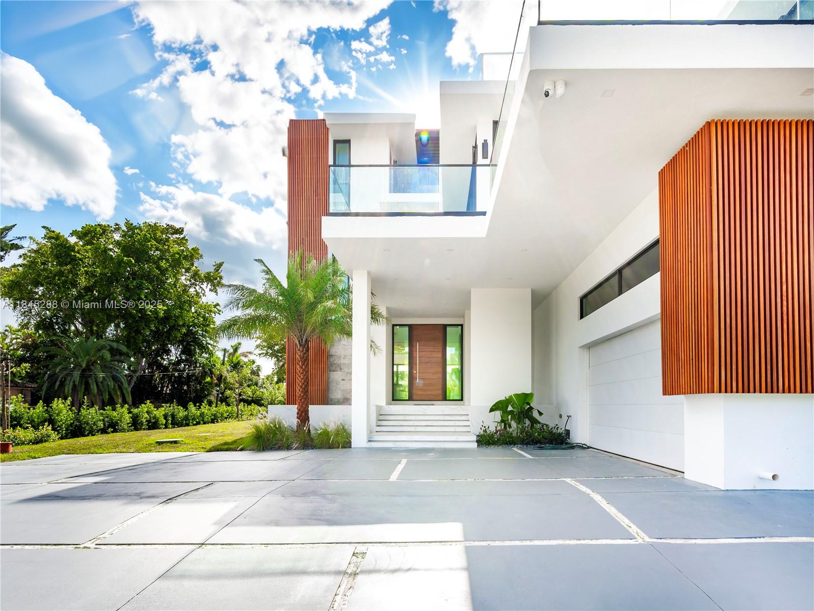 1248 Northeast 89th Street Miami, FL 33138 - Photo 61 of 66 a view of a house with a street