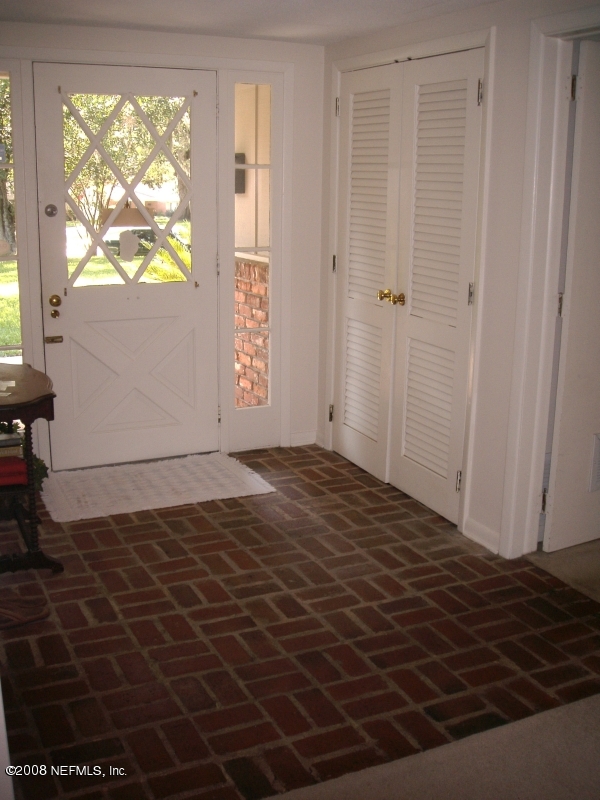 7843 Holiday Road South Jacksonville, FL 32216 - Photo 2 of 13 a view of empty room with window