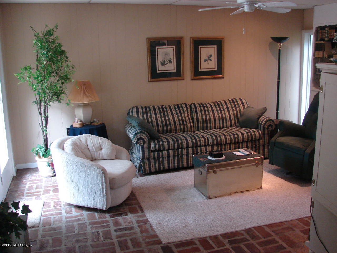 7843 Holiday Road South Jacksonville, FL 32216 - Photo 4 of 13 a living room with furniture