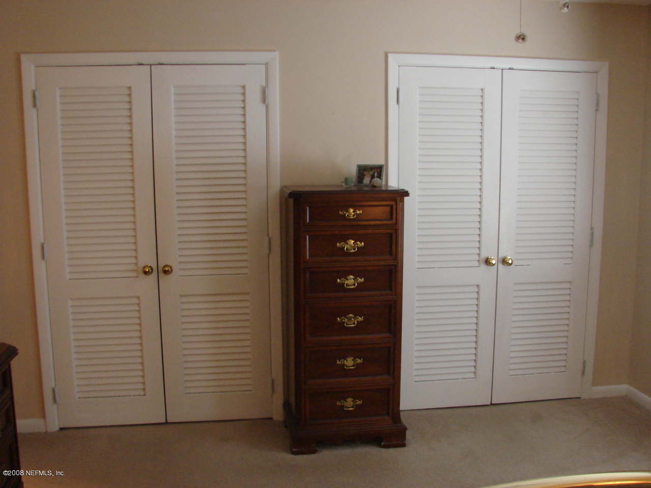 7843 Holiday Road South Jacksonville, FL 32216 - Photo 8 of 13 an empty room with closet