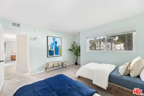 a view of a bedroom with a wardrobe space