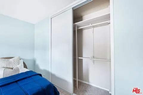 a view of a hallway with white walls