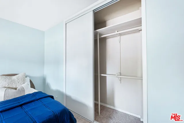 a view of a hallway with white walls