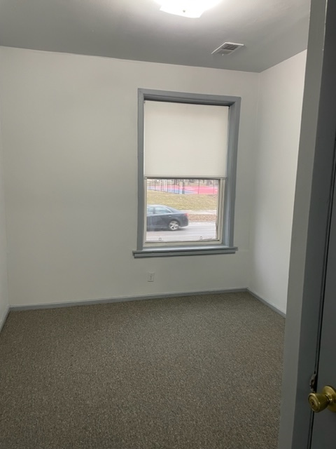 1237 West Marquette Road, Unit 1W Chicago, IL 60636 - Photo 8 of 9 an empty room with a window