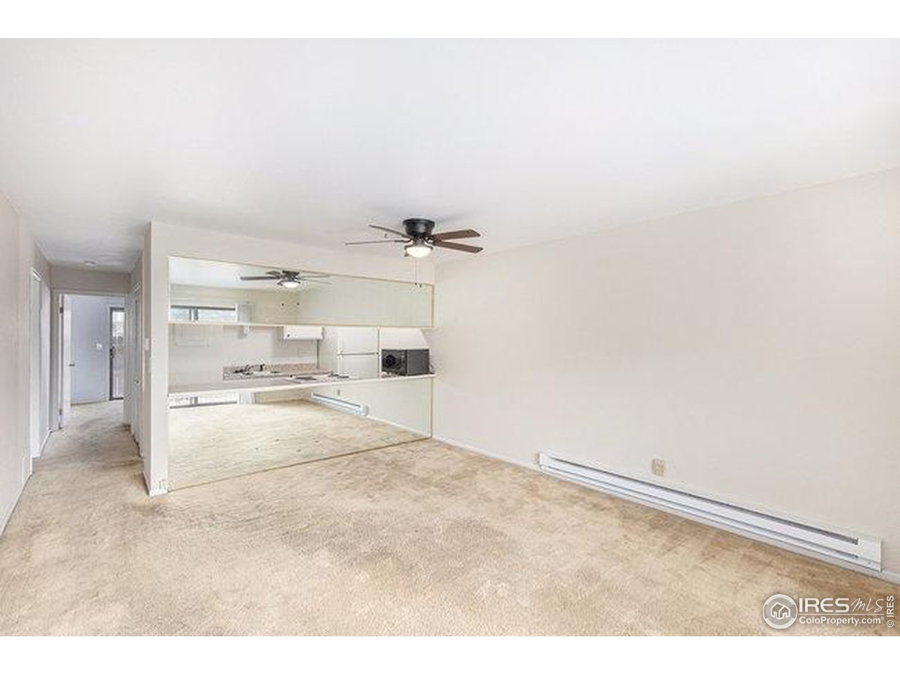 806 Stone Mountain Drive, Unit 103 Windsor, CO 80550 - Photo 5 of 10 a view of empty room