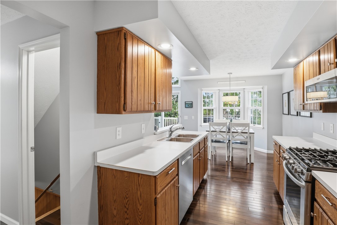 56 Cove Road Canandaigua City, NY 14424 - Photo 12 of 47 Another view of the kitchen with Brazilian Harwood