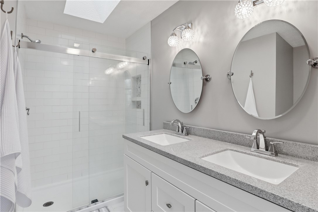 56 Cove Road Canandaigua City, NY 14424 - Photo 23 of 47 Private primary bedroom full bathroom with a walk-