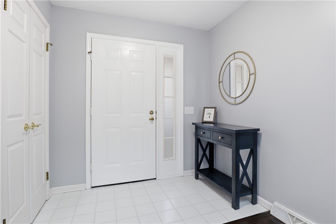 56 Cove Road Canandaigua City, NY 14424 - Photo 4 of 47 Front foyer/entry with ceramic tile flooring.