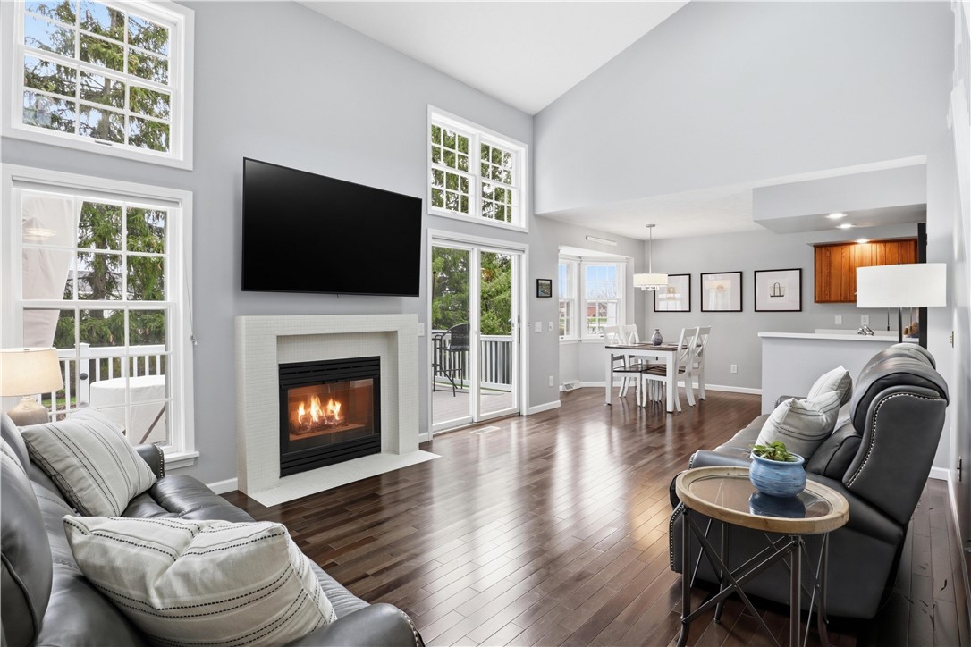 56 Cove Road Canandaigua City, NY 14424 - Photo 5 of 47 Living room with Brazilian Hardwood flooring, gas