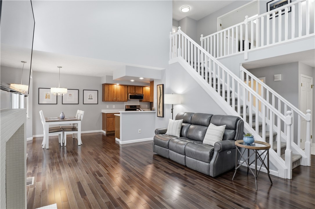 56 Cove Road Canandaigua City, NY 14424 - Photo 6 of 47 Another view of the living room with Brazilian Har