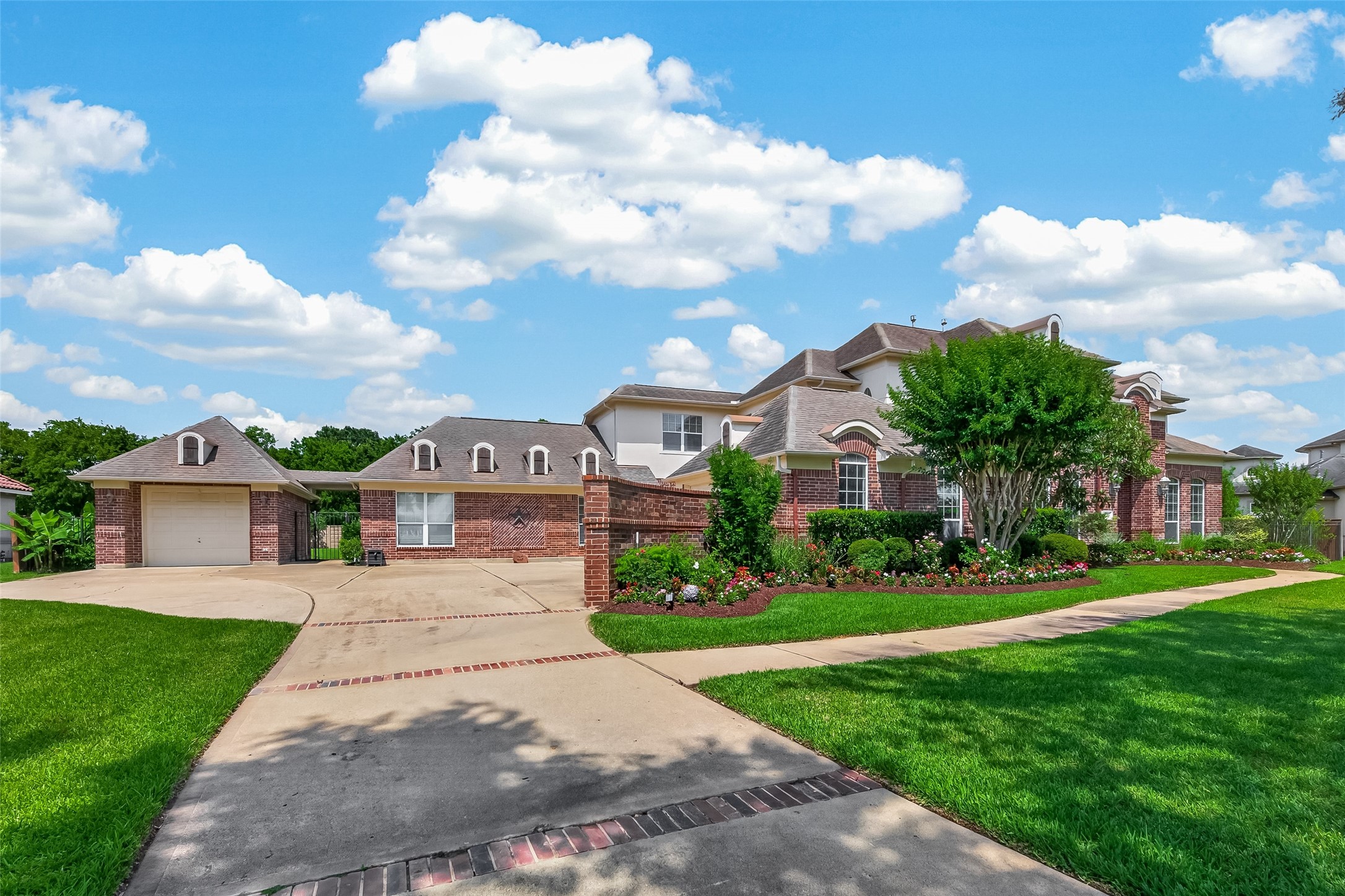 2319 Braer Ridge Drive Katy, TX 77494 - Photo 5 of 50 a front view of a house with garden
