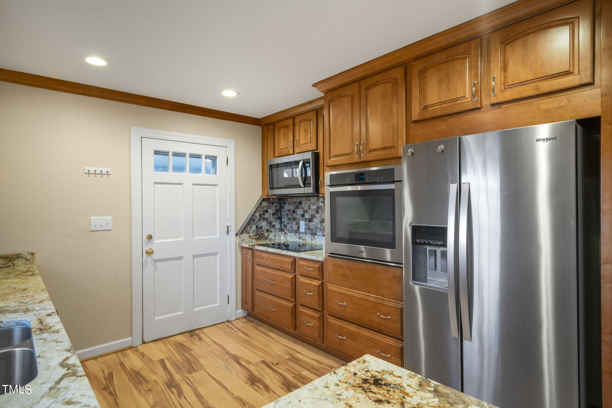 13573 Old Smithfield Road Sims, NC 27880 - Photo 11 of 33 a kitchen with stainless steel appliances granite countertop a refrigerator and a sink