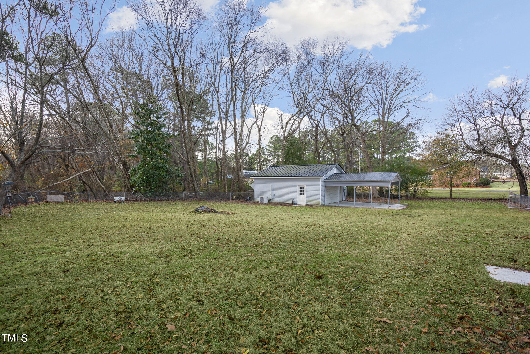 13573 Old Smithfield Road Sims, NC 27880 - Photo 27 of 33 a house with trees in front of it