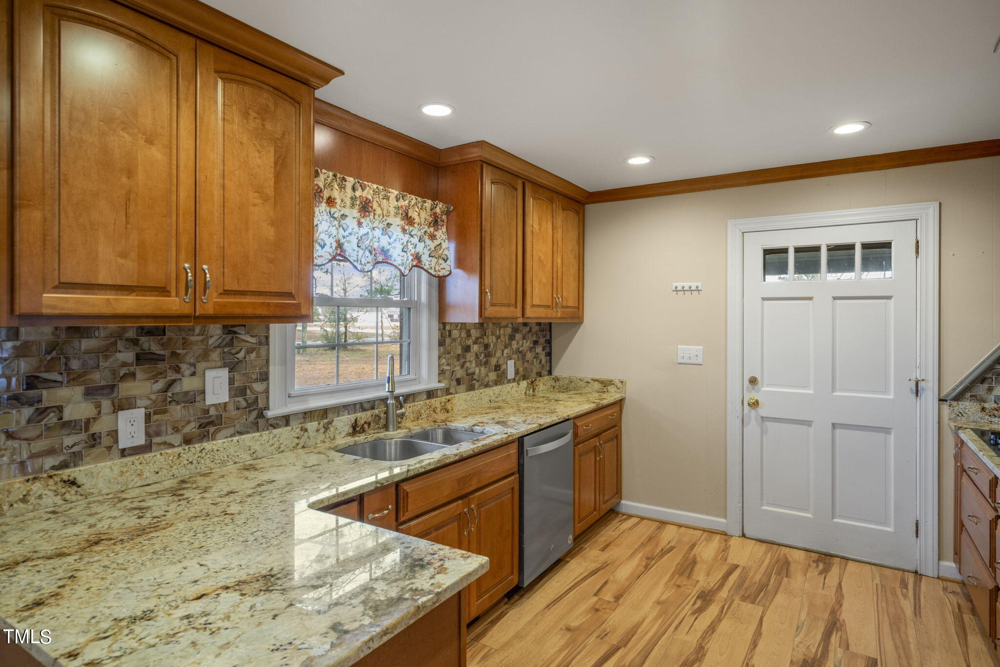 13573 Old Smithfield Road Sims, NC 27880 - Photo 7 of 33 a kitchen with stainless steel appliances granite countertop a sink and cabinets