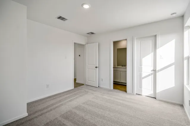 an empty room with a natural light