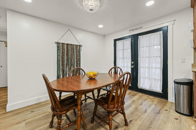 822 Pinewood Circle Price, UT 84501 - Photo 7 of 49 Bright dining area featuring light wood-finish flooring with french doors leading to back covered deck.