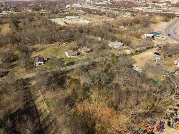 an aerial view of house with yard