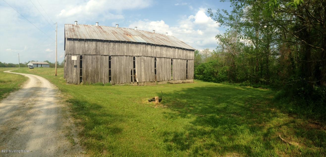 Barn not included with this land. Property Entrance is right before this barn and land lays to right of this Barn in photo.